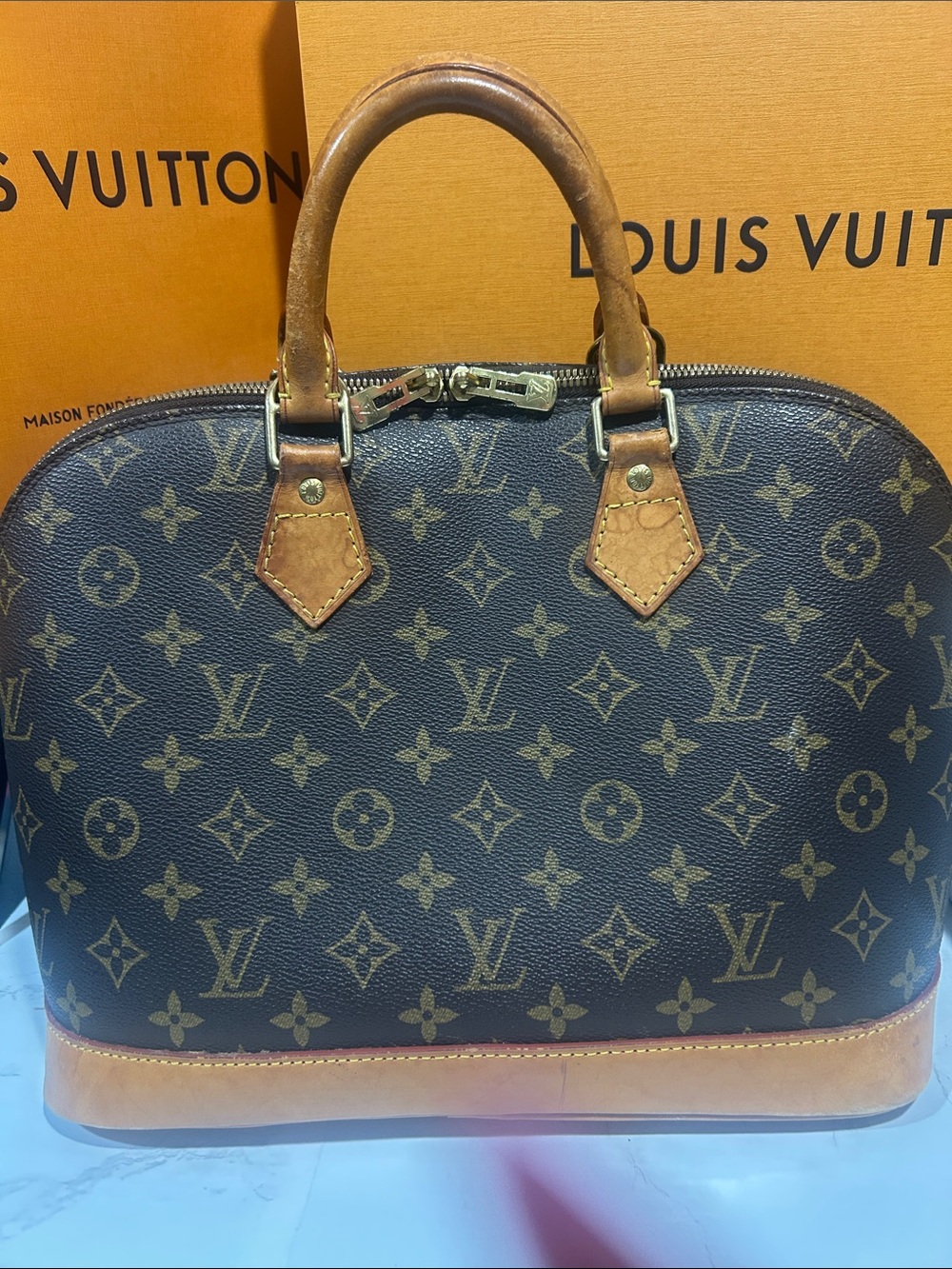 Louis Vuitton Monogram Alma Satchel in Brown and Tan